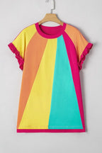 Colorblock t-shirt with yellow, orange, teal, and magenta panels, ruffle sleeves, on hanger